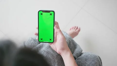 Smartphone with Green Screen on a Gray Surface Stock Footage 315975417