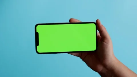 Smartphone with Green Screen in Hand Stock Footage 325036288