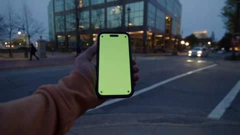 Smartphone With Green Screen Held By Man In Night City With Blurred Urban Stock Footage 314344032