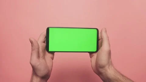 Smartphone with green screen in horizontal position Видео 157212087