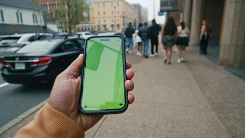 Smartphone With Green Screen In Man Hand On Urban Street Outdoors Stock Footage 326171985