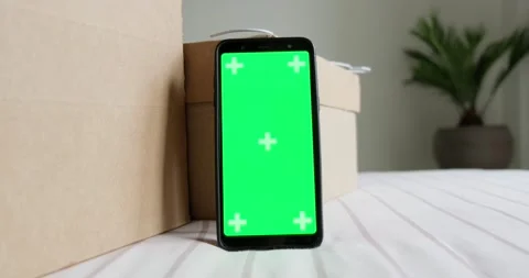 Smartphone green screen mock up with card storage boxes. Stock Footage 155073340