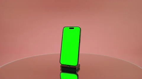 Smartphone With Green Screen Mockup on Pink Background Stock Footage 335866724