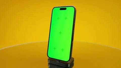 Smartphone green screen mockup on yellow background Stock Footage 334954170