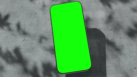 Smartphone with green screen smooth rotating , three scenes set on a concre.. Stock Footage 311056191