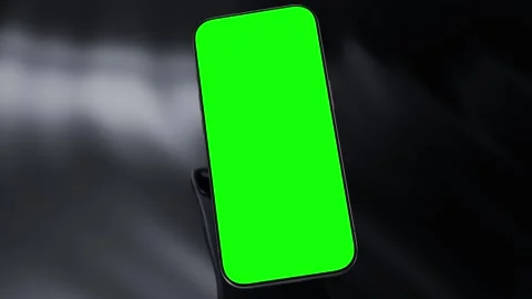Smartphone with green screen smooth rotating , three scenes set on a sleek .. Stock Footage 311056448