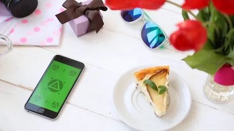 Smartphone With Green Screen On The White Table Mockup Panorama Shot. Stock Footage 116613657