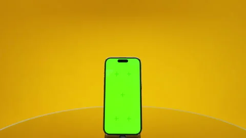 Smartphone Green Screen On Yellow Background Stock Footage 335941981