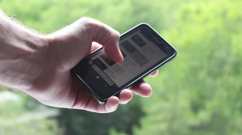 Smartphone in hand Vídeos de archivo 52509457