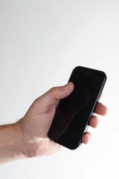 Smartphone in Hand. Stock Photos
