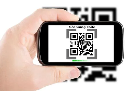 Smartphone in hand scanning code Foto stock