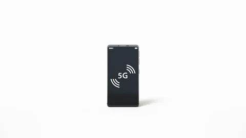 Smartphone isolated on white background, 5g symbol on lcd. 動画素材 117148997
