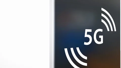 Smartphone isolated on white background, 5g symbol blinks on screen. 動画素材 117149743