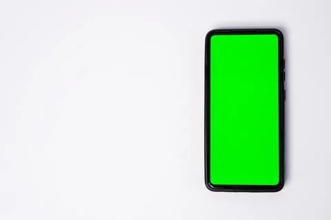 A smartphone key green screen placed vertically on the right side, leaving .. Stock Photos