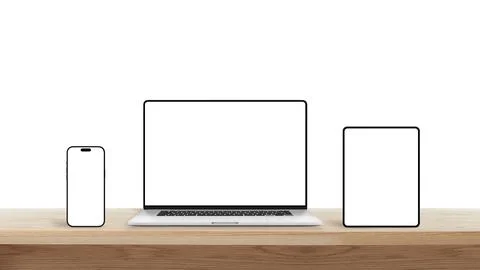 Smartphone, laptop, and tablet with blank screens on wooden desk, represent.. Stock Photos