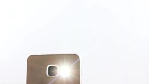 Smartphone LED.Flashlight turned on on the smartphone. Bright LED flashlight Stock Footage 202616873