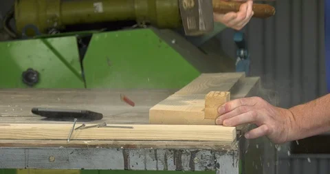 The smartphone lies on the table next to the workpiece Stock Footage 115453160