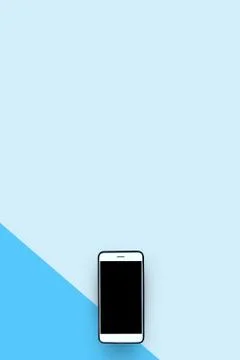 Smartphone on light blue background two tone Stock Photos