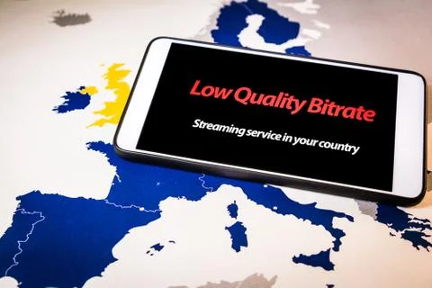 Smartphone with low bitrate message on screen over an EU map Stock Photos