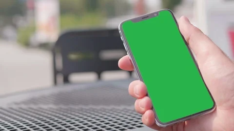 Smartphone, Man Holding Mobile Smart Phone Device, Green Key Chroma Screen Stock Footage 94221545