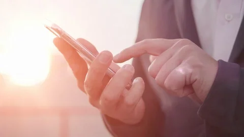 Smartphone Man Using Mobile Phone in Sun Young Hand Close Up Business Background Stock Footage 95766125