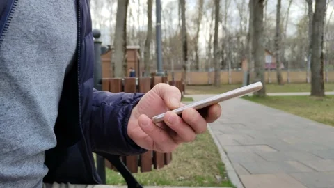 Smartphone in a man's hand close-up Stock Footage 188340323