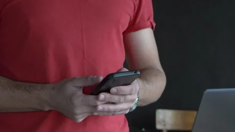 A smartphone in a man's hands 4K Video stock 320868005