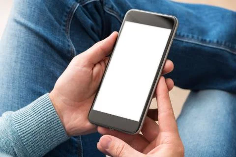 Smartphone in man's hands. Clipping path included 写真素材