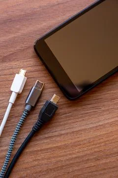 Smartphone with mini usb, micro usb, usb type c plugs Stock Photos