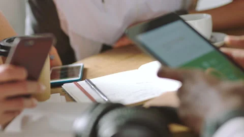 Smartphone, mobile app and creative people in business meeting planning strategy Stock Footage 212602529