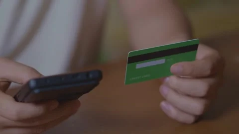 Smartphone Mobile Payment Using Credit Card for E-Commerce or Online Purchase Stock Footage 293763014