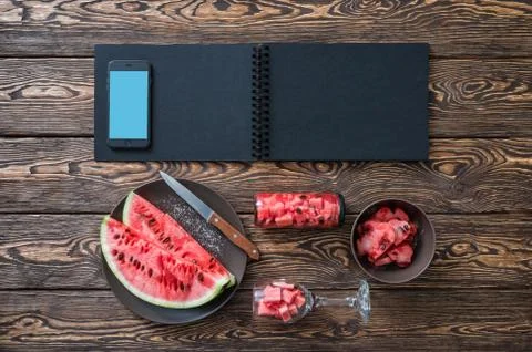 Smartphone mock-up on kitxhen table Stock Photos