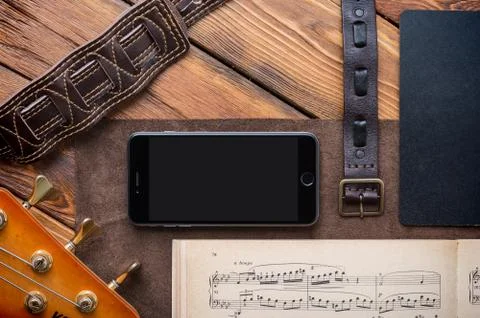 Smartphone mock-up over musical notes Stock Photos