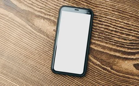Smartphone mockup with solid white color blank empty isolated screen on woo.. Stock Photos