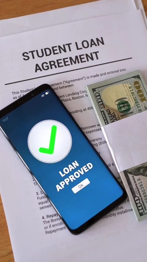 Smartphone notification of student loan approved. Concept of getting in debt to Stock Footage 308994508