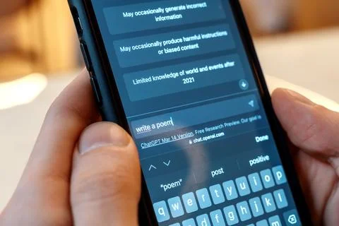 Smartphone with opened AI chat in it 写真素材