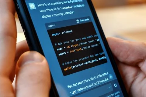 Smartphone with opened AI chat in it 库存照片