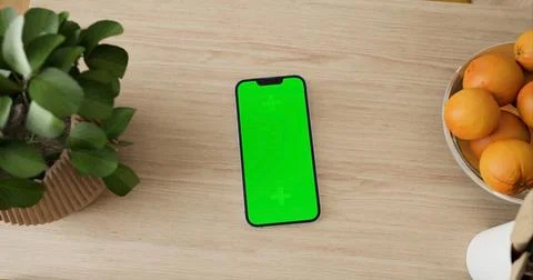 Smartphone place on table, Green screen telephone Stock Illustration