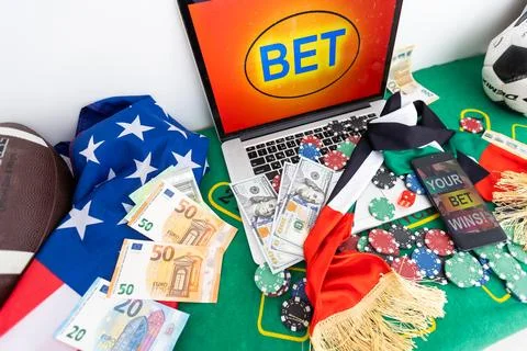 Smartphone with poket table on screen, playing cards and chip cards on poker 写真素材