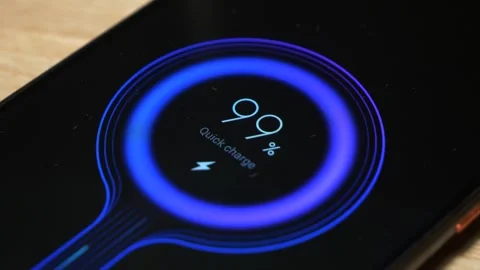 Smartphone quick charge modern screen animation with fast moving blue particles Stock-Footage 257256095