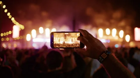 Smartphone Recording Stage Fire Effects During Festival Performance Stock Footage 345895261