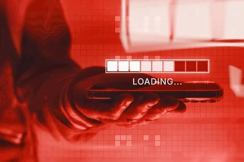 Smartphone on a red background with a loading indicator symbolizes a cyber .. Stock Photos