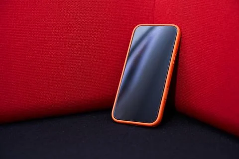 Smartphone on Red Background - Modern Technology Concept Foto stock