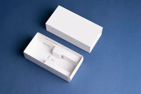 Smartphone-s pull out boxes on blue surface mock-up series Stock Photos