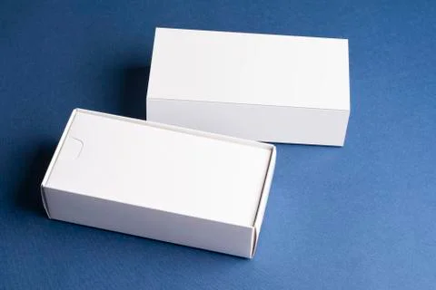 Smartphone-s pull out boxes on blue surface mock-up series Stock Photos
