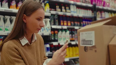 Smartphone scanning experience in retail store for storage container selection Stock Footage 293675337