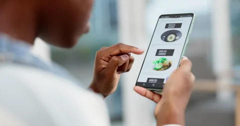 Smartphone, screen and hands scroll menu, restaurant website and e commerce with Stock Footage 247538450