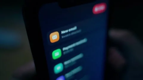 Smartphone screen with constantly incoming notifications Stock Footage 340388472