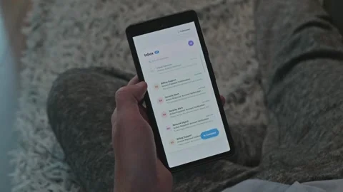 Smartphone screen continuously receiving multiple incoming email notifications Stock Footage 341569202