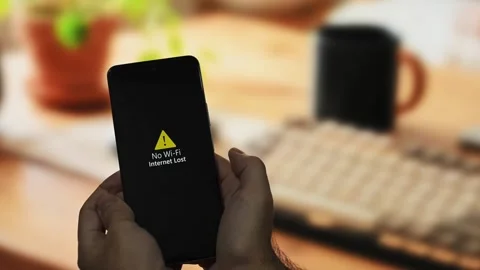 Smartphone screen displaying internet lost no wi-fi signal detected 2 Stock Footage 340510135